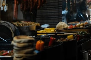 Street food cooking scene at night